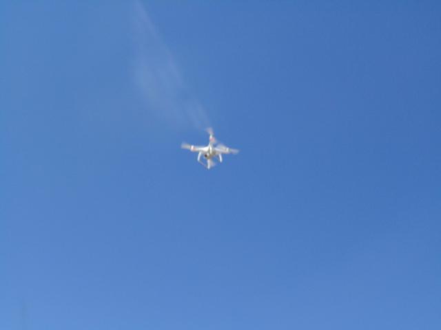 (a drone photographing the parade)